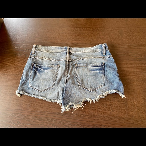 ❌❌SOLD❌❌ Free People | Distressed Blue Jean Shorts (27) - Picture 2 of 5